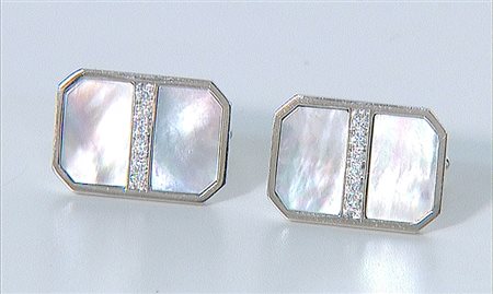 POLSINI COPPIA DI POLSINI. In oro bianco 18 kt di forma rettangolare con...