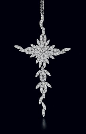 CIONDOLO CIONDOLO. In oro bianco 18 kt a grande croce realizzata da settori a...