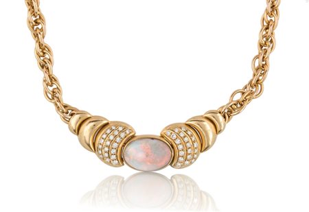 COLLANA COLLANA. In oro giallo 18 kt a maglie ovali con motivo centrale...