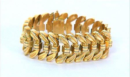 BRACCIALE BRACCIALE ANNI '40 CA. In oro giallo 18 kt con maglie a fiocco...
