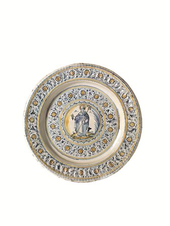 BACILE, FAENZA, INIZIO SECOLO XVIIin maiolica, forma apoda con umbone...