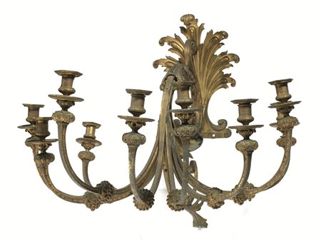 GRANDE APPLIQUES, SECOLO XVIIIin bronzo dorato a nove bracci a volute con...