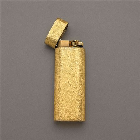 Accendino placcato oro giallo, garanzia, chiave e astuccio originali,...