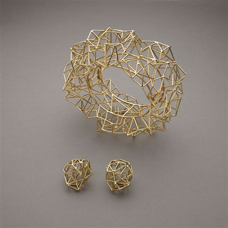 Parure: bracciale ed orecchini in oro giallo, trattasi dei primi campioni...