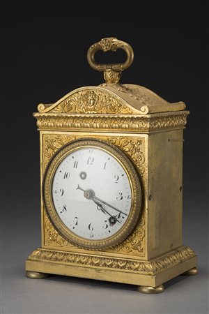 Orologio marescialla in bronzo dorato, Svizzera Inizio sec. XIX ca. Movimento...