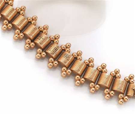 BRACCIALE, ANNI '40, IN ORO ROSArealizzato ad una linea centrale di barilotti...