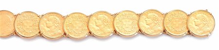 BRACCIALE IN ORO GIALLO E MONETErealizzato ad una fila di nove franchi...