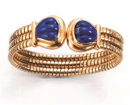 BRACCIALE IN ORO GIALLO E LAPISLAZZULIrealizzato a cerchio semirigido a tre...