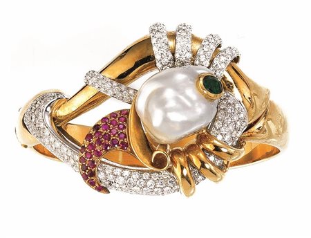 BRACCIALE IN ORO GIALLO, PERLA BAROCCA, RUBINI, SMERALDO E DIAMANTIrealizzato...