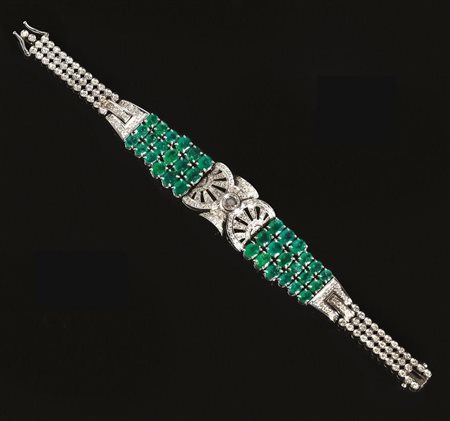 BRACCIALE IN ORO BIANCO 18 K E 14 K, SMERALDI E DIAMANTIrealizzato a nastro...