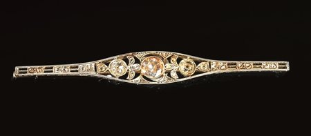 SPILLA IN ORO BIANCO, ORO GIALLO E DIAMANTImodellata come una barretta con...