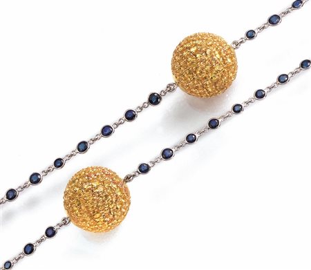 LUNGA COLLANA IN ORO BIANCO, ZAFFIRI E ZAFFIRI GIALLI realizzata ad una fila...