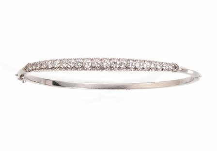 BRACCIALE IN ORO BIANCO E DIAMANTIrealizzato a cerchio rigido ad una linea di...
