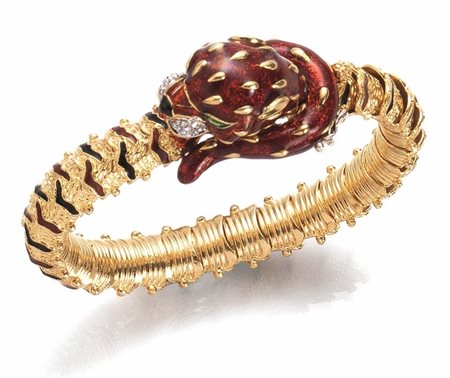 BRACCIALE IN ORO GIALLO, DIAMANTI E SMALTIrealizzato ad una fila di maglie...