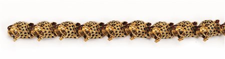 BRACCIALE IN ORO GIALLO E SMALTIrealizzato ad una fila di dieci teste di...