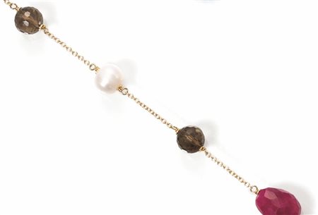 COLLANA LUNGA IN ORO GIALLO, QUARZO FUME' E QUARZO ROSSOrealizzata ad una...