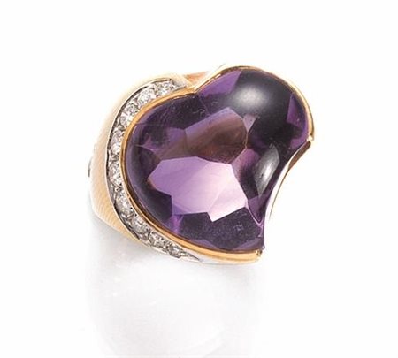 ANELLO IN ORO GIALLO, AMETISTA E DIAMANTIdi forma fantasia con ametista a...