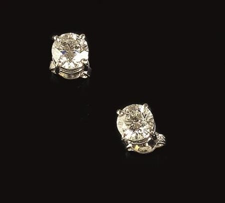 PAIO DI ORECCHINI PUNTO LUCE IN ORO BIANCO E DIAMANTIciascuno realizzato con...