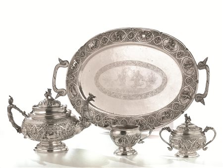 SERVITO DA TE', INDIA, SECOLO XX in argento riccamente sbalzato e cesellato...