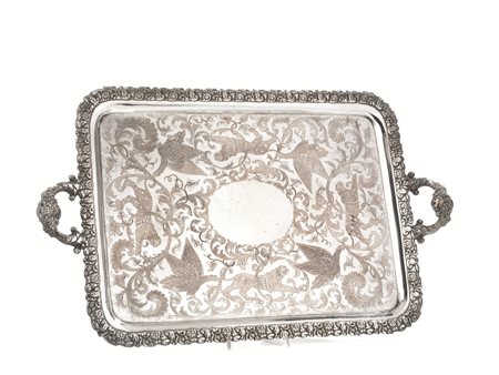 GUANTIERA, SECOLO XIXin rame argentato, di forma rettangolare, tesa decorata...