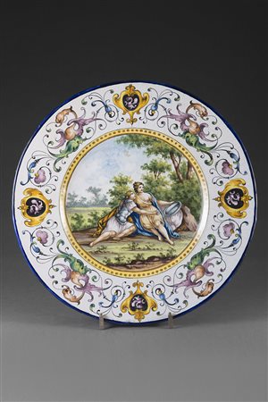 Manifattura Centro Italia inizio del sec. XIX Piatto in maiolica decorato...