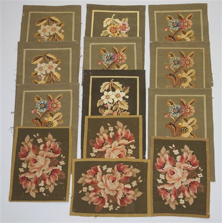 Lotto composto da tredici cuscini ricamati a piccolo punto (49x36cm) con...