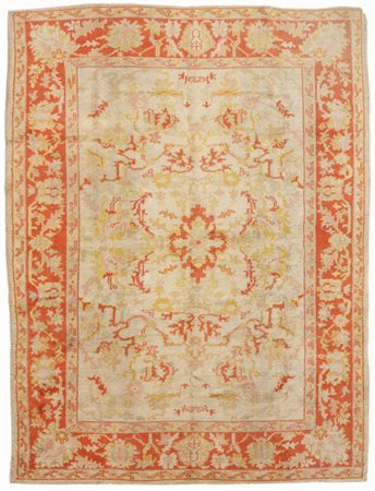 Tappeto Ushak Anatolia sec. XX, disegno floreale color corallo su fondo...