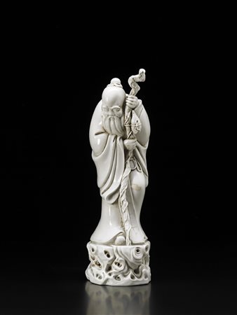 Porcellana blanc-de-Chine raffigurante l'Immortale Li Tieguai dalla lunga...