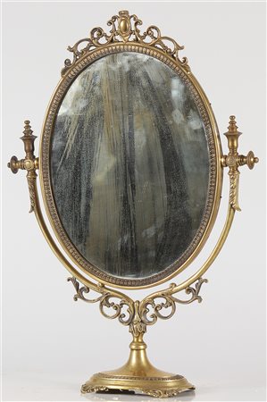 MANIFATTURA DEL XIX SECOLO Specchiera. Metallo dorato. Cm 40,00 x 57,00.