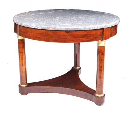 TAVOLO DA CENTRO IMPERO Francia, XIX Sec. in mogano, piano circolare in marmo...