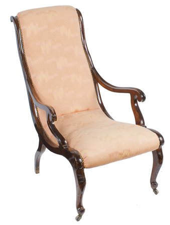 POLTRONA IN LEGNO TINTO MOGANO Inghilterra, inizio XX Sec. schienale e seduta...