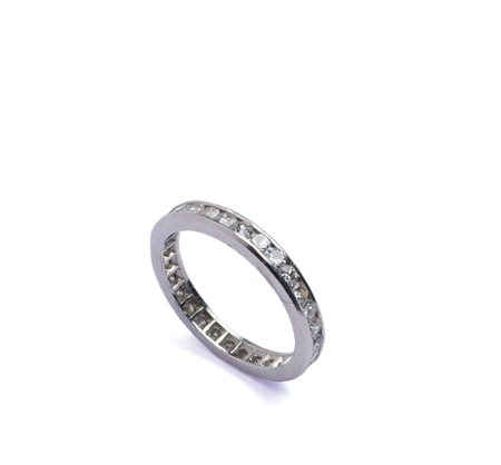 ANELLO FEDE IN PLATINO E DIAMANTI TAGLIO BRILLANTE ct 0,90 punti circa,...