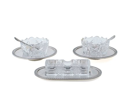 SET DA TAVOLA IN ARGENTO STILE IMPERO Italia, XX Sec. composto da una coppia...