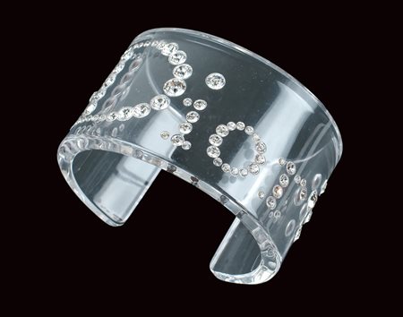 CHRISTIAN DIOR, BRACCIALE RIGIDO BIJOU VINTAGE in plexiglass e swarovsky A...