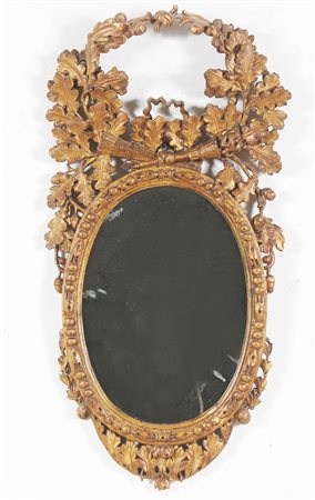 MANIFATTURA GENOVESE DEL XVIII SECOLO Elegante specchiera scolpita a motivi...