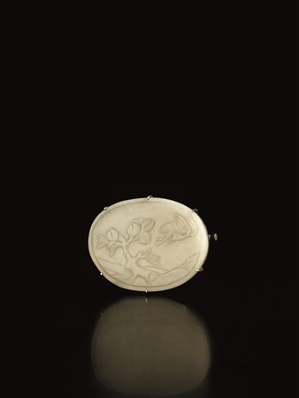 DUE INTAGLI, CINA, SEC. XX una in giada verde celadon con caratteri, una...