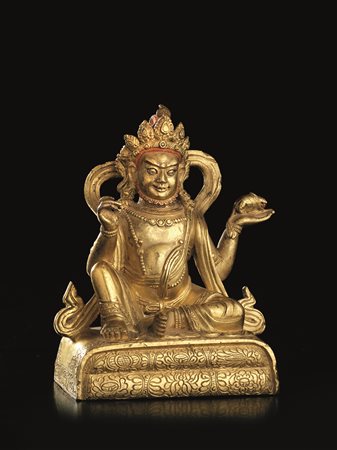 SCULTURA, CINO TIBETANA, SECC. XVIII-XIX in bronzo dorato, raffigurante...