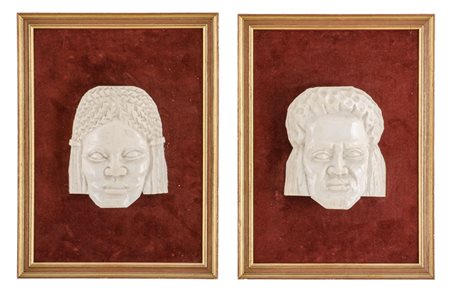 COPPIA SCULTURE in avorio "maschere" entro cornici. Africa primi '900 Misure:...