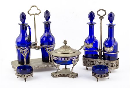 LOTTO composto da due MENAGE in argento e vetro decorato, FORMAGGIERA in...