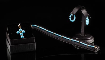 LOTTO composto da PENDENTE a croce in turchese ed oro giallo 18 kt.,...