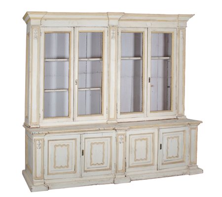 LIBRERIA doppio corpo a quattro ante in legno laccato. Sicilia XIX secolo...