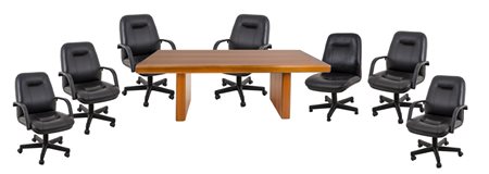 TAVOLO da riunione in noce con sette POLTRONE in vilpelle. XX secolo Misure:...