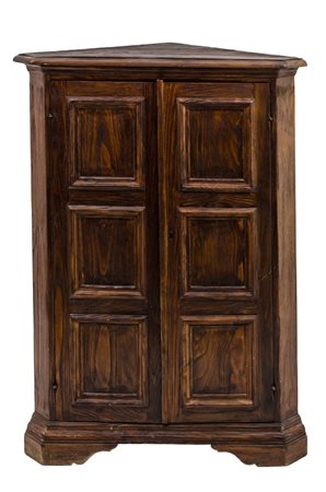 ANGOLIERA in castagno con due ante bugnate. Italia XX secolo Misure: cm 82 x...