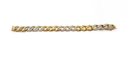 BRACCIALE BRACCIALE. In oro giallo e bianco 18 kt a maglie groumette lisce...