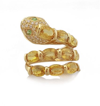 ANELLO ANELLO. In oro giallo 18 kt realizzato a serpente con decori in...