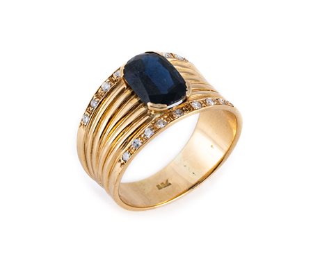 Anello in oro giallo, zaffiro e diamanti