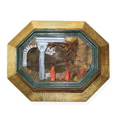 Presepe in corallo rosso entro cornice in legno dorato