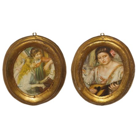 Coppia di cornici ovali dorate a foglia con stampe