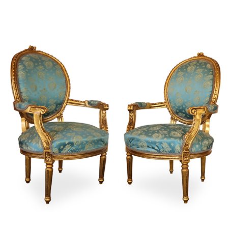 Coppia di poltrone in legno dorato con tappezzeria blu, 20° secolo