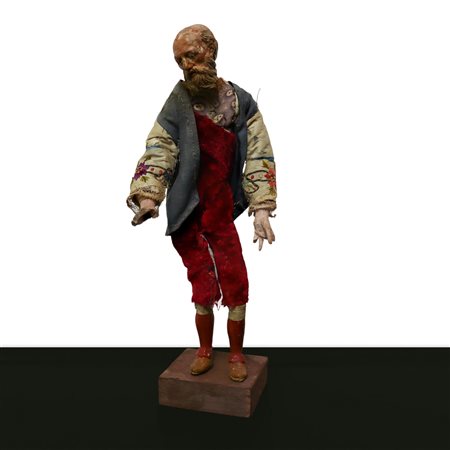 Pastore presepiale napoletano con volto mani e gambe in terracotta e abiti in tessuto